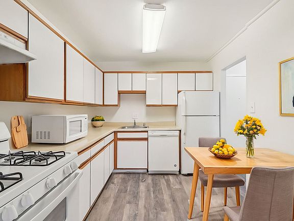 White kitchen with ample cabinet storage