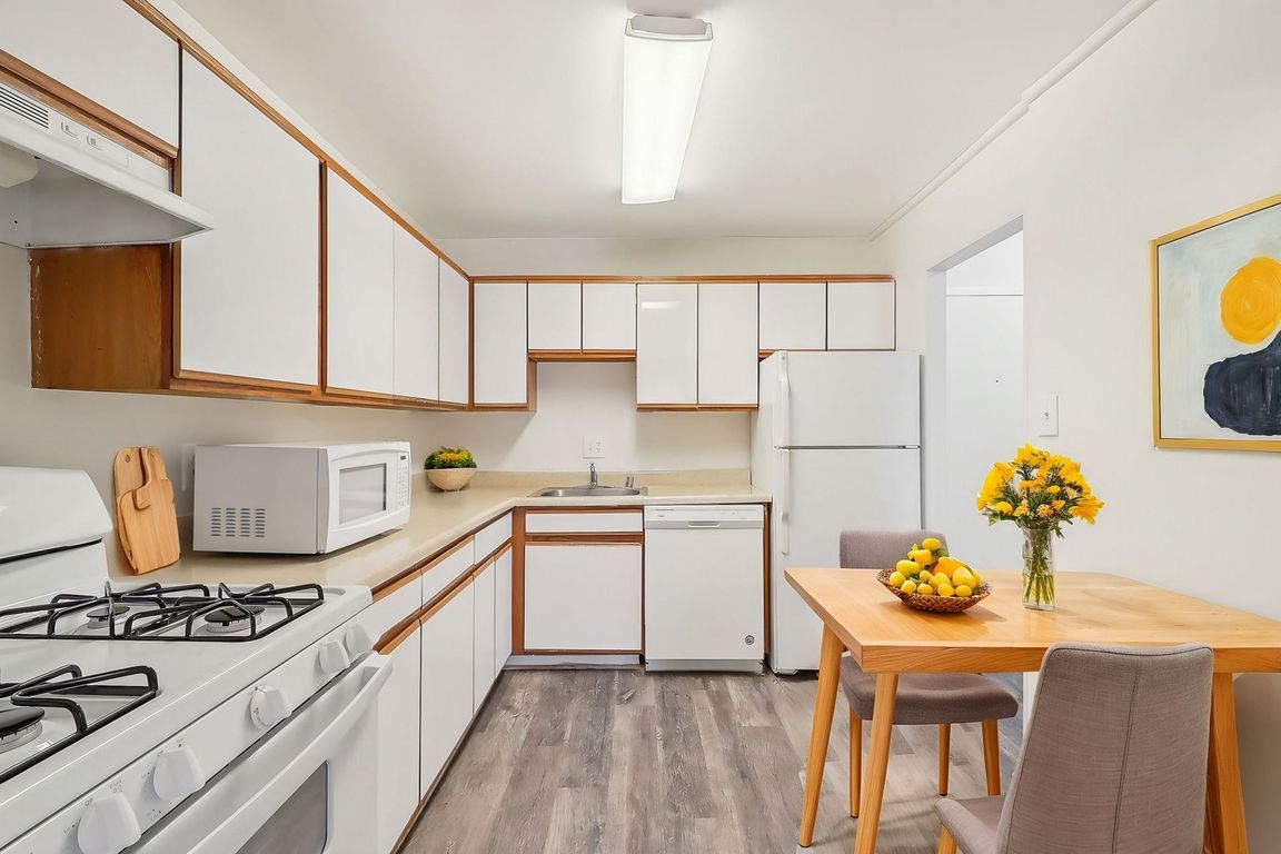 White kitchen with ample cabinet storage