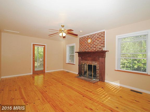 Cozy Family Room with a wood burning FP