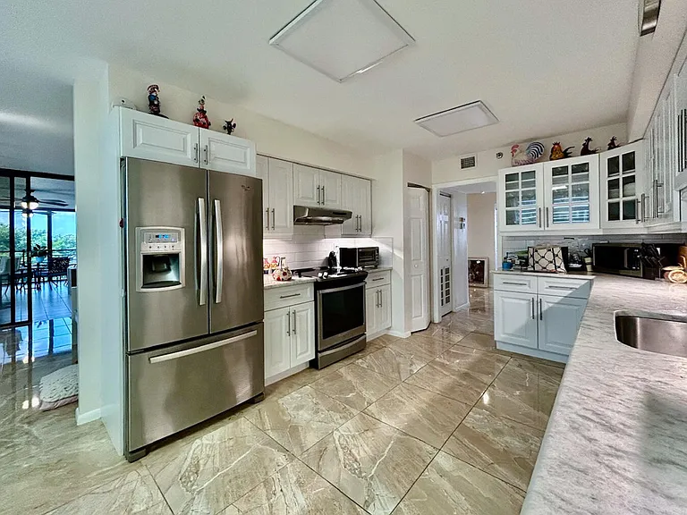 7568 Regency Lake Dr #602 — Photo 25