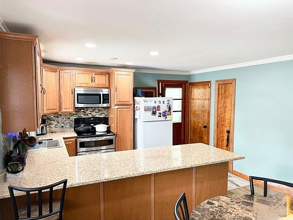 5th image of 9 Alpha St