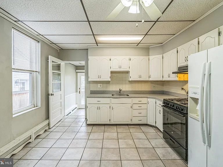 4658 Mansion St — Photo 9