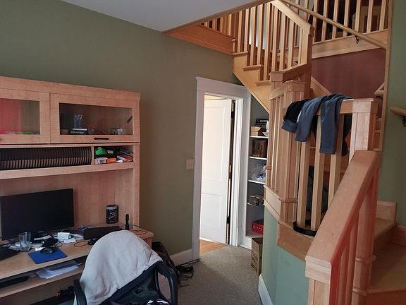 Office area and master staircase to attic suite