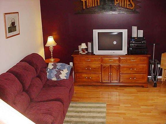 Spacious living room with hardwood fllors