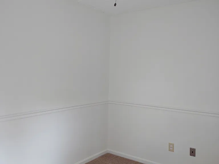 This photo has not been altered in any way: no edits or filters have been applied to try to deceive the viewer by having the room appear larger or brighter than it actually is.