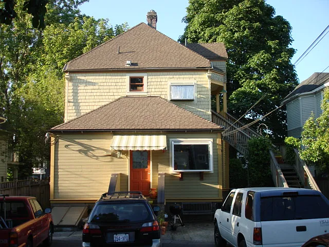 608 North I Street, Back of Home, Parking/ Entrance to 608A apartment is center and Entrance Staircase to 608B is on the Left.