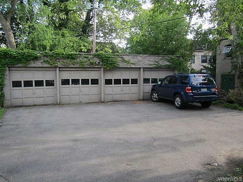 four car garage at the back. left two spots are for the front unit and the right two spots are for the back unit. 
The left two spots come with the front unit rent.