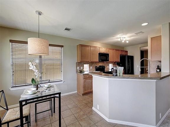 Breakfast Area leads to open Kitchen