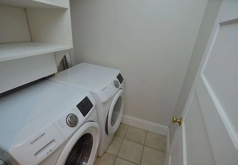 off kitchen is an unit washer and dryer