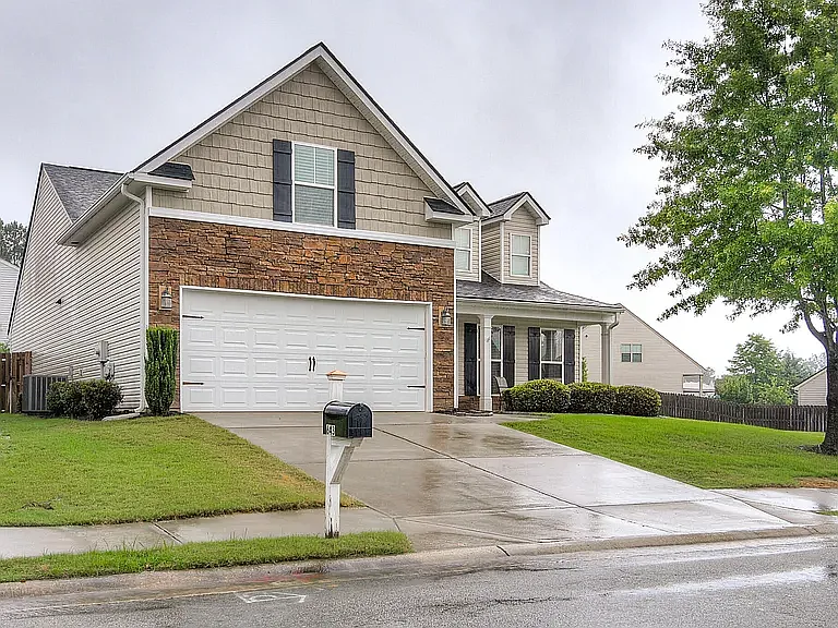 Front View of House on corner lot.