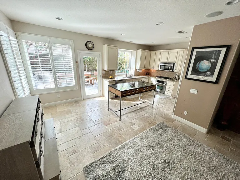 Kitchen with wine table island