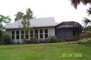 Rear view- screened patio