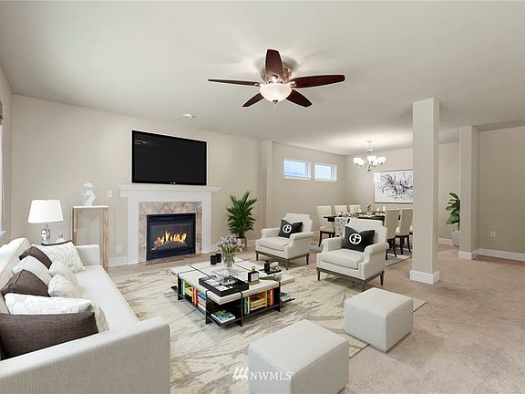 Large open concept living with views of kitchen, dining, eat-in kitchen, deck and beautiful backyard with expansive greenbelt. Virtually Staged 