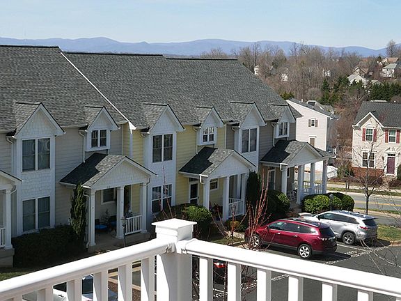 Master suite on 3rd level has small porch, west facing.