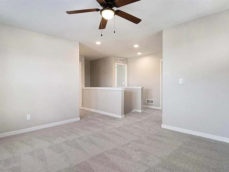 Large loft for flex space to use as office or game room.
