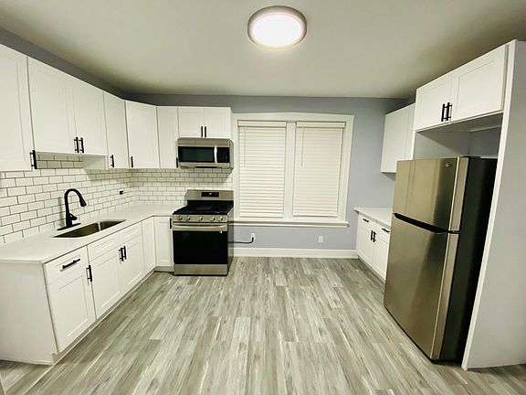 Kitchen with back door view