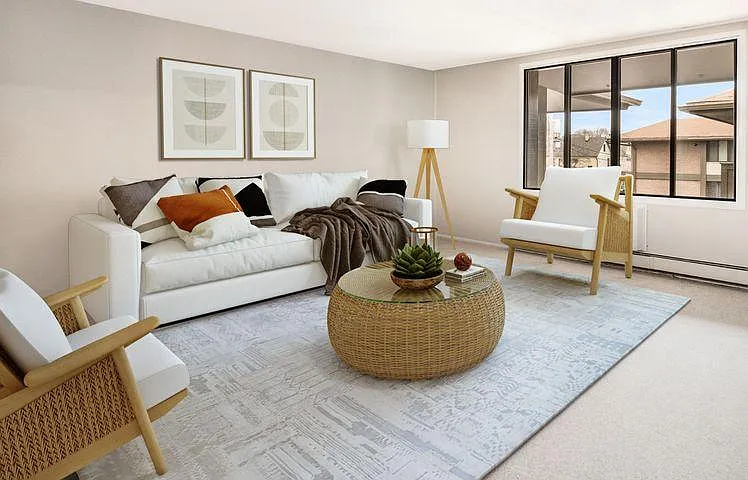 Sunny & Spacious Living Room - 
Photos may be enhanced/virtually staged. - 2025 E Greenwich Ave #320
