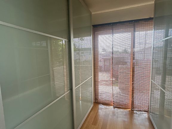 Frosted glass closet door(s) with built in closet storage. 
Walk thru the closet to the private patio off the master bedroom.