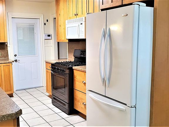 Gas Stove (5 Burners) and Frig convey with property.