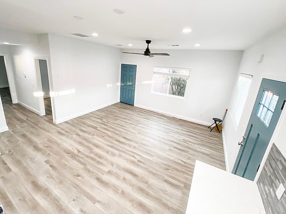 Living room with 9ft ceiling - LVP flooring throughout