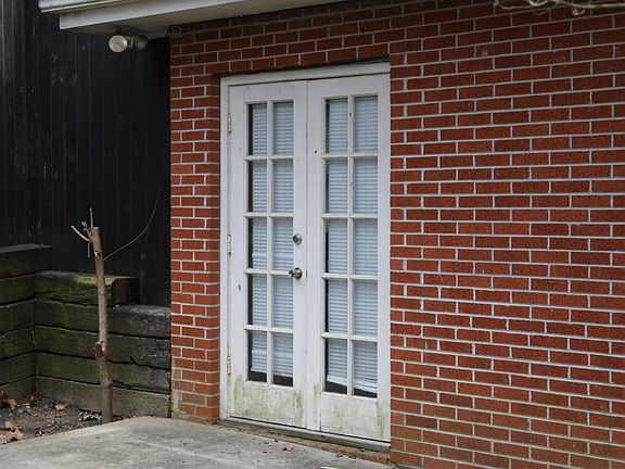 French doors off of back bedroom