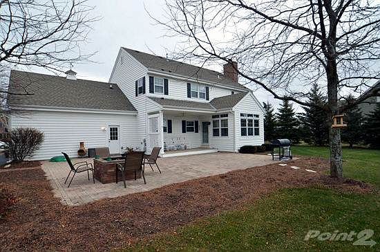 Rear of home with New Patio & Fire Pit