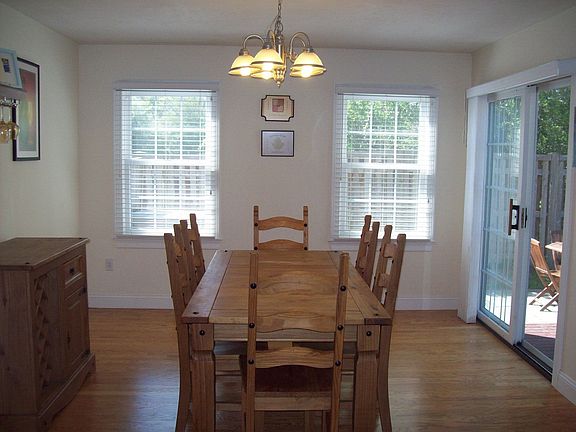 Dining room with sliders to deck