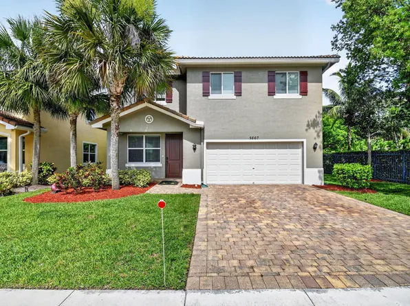 5667 Caranday Palm Drive, Greenacres, FL 33463