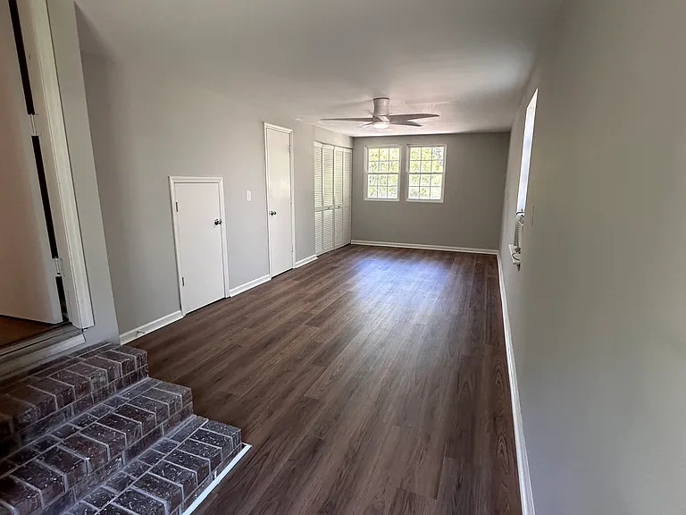 Finished garage with laundry hook-up and 1/2 bathroom