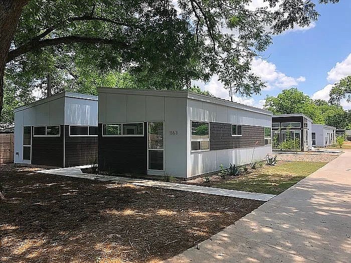 Complex with private drive.