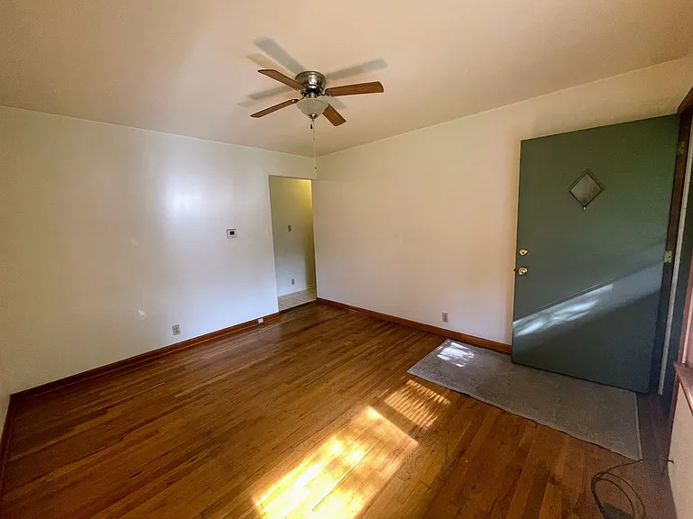 Living room door opens to yard
