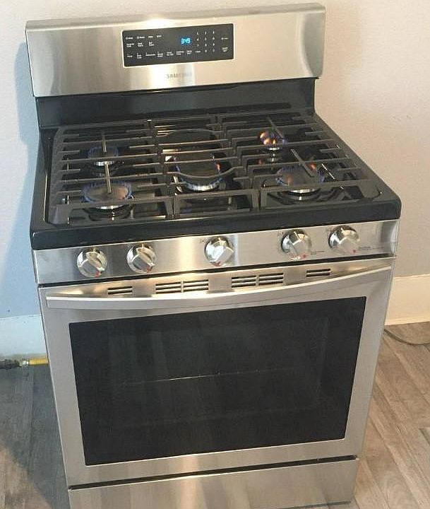 Gas stove provided in kitchen.