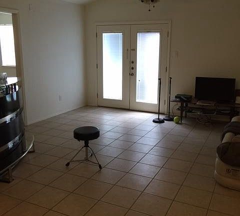 Living room with vaulted ceiling