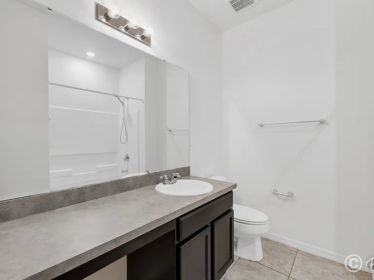 7608 Sunshine Bridge Ave — Photo 15
