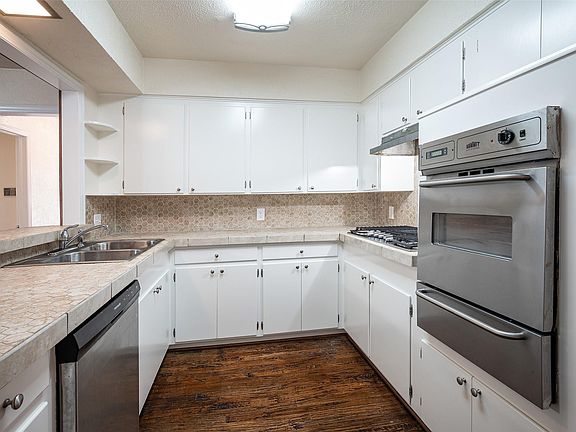 Lots of cabinets, SS appliances and new refrigerator
