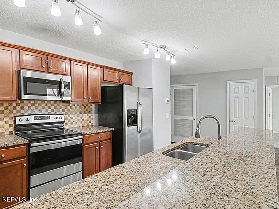 5th image of 9180 MILL GROVE Drive