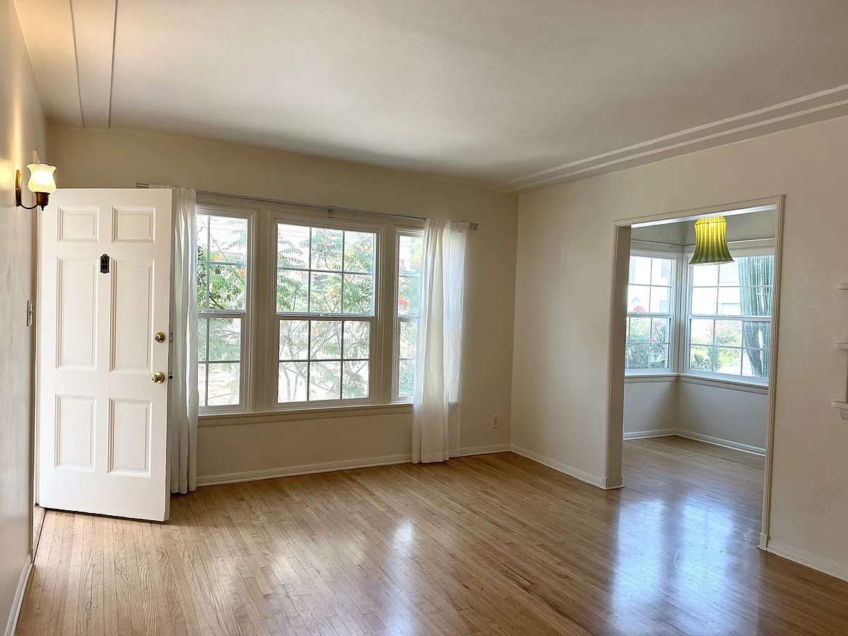 Living room with large window - 327 N Spaulding Ave