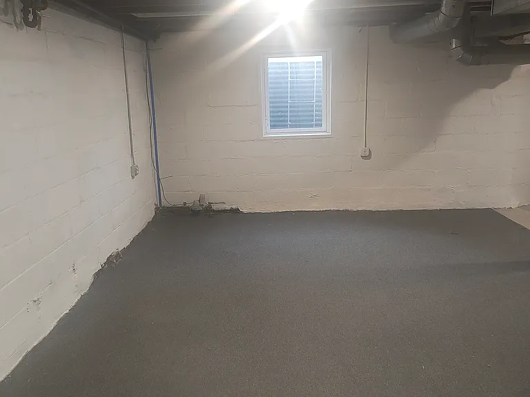 main basement area with egress window