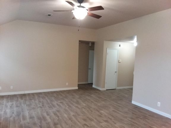 Living room with view of entryway (new tile)