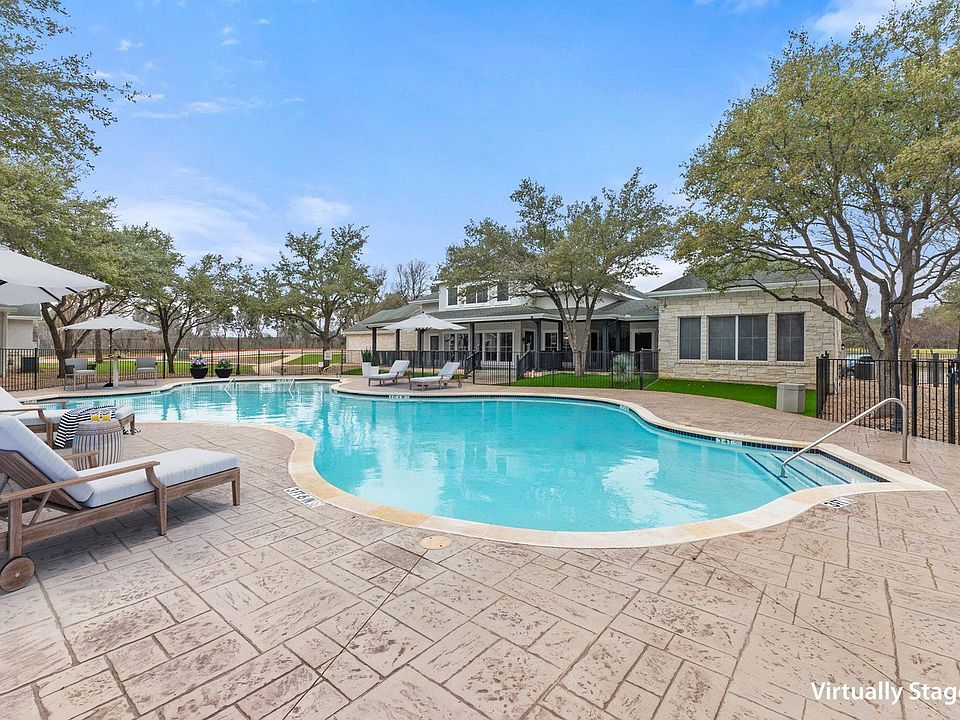 Relax by the Swimming Pool at Fort Branch at Truman's Landing in Austin, TX