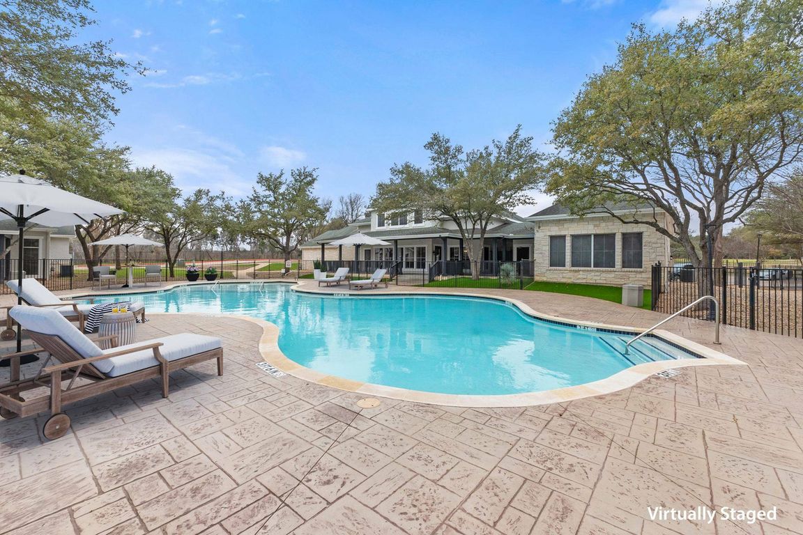 Relax by the Swimming Pool at Fort Branch at Truman's Landing in Austin, TX