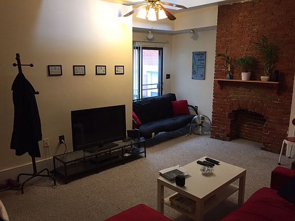 Living room with skylights. Opens to deck