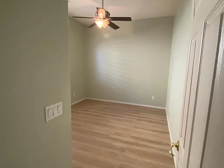 Bedroom 1, brand new L.V.P.-Luxury Vinyl Plank flooring, fresh paint. Picture taken November 13, 2023 during afternoon.