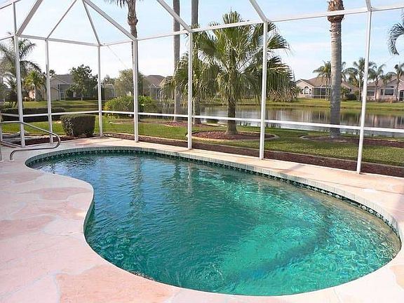 Inviting pool by pond