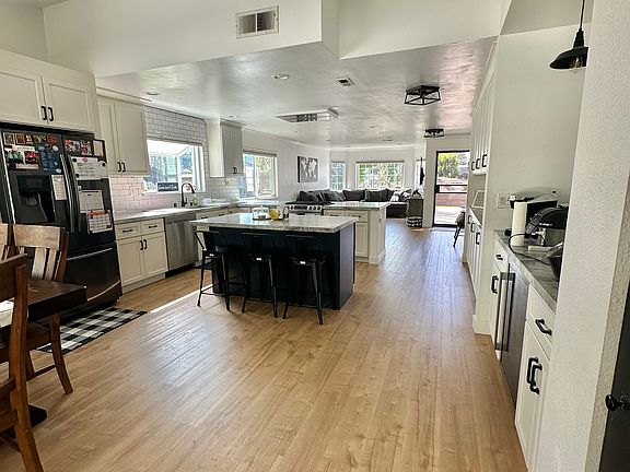 Ample counterspace with coffee bar and refreshments in beverage fridge