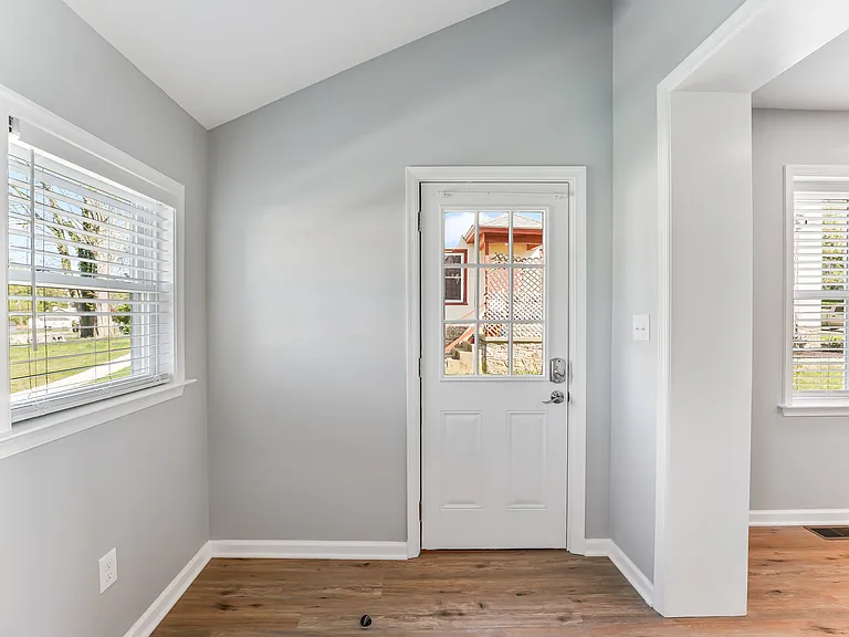 Entry and mudroom off the dedicated parking lot