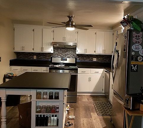 updated kitchen, glass tile backsplash