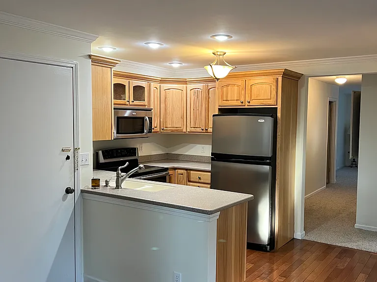 Kitchen with wood flooring