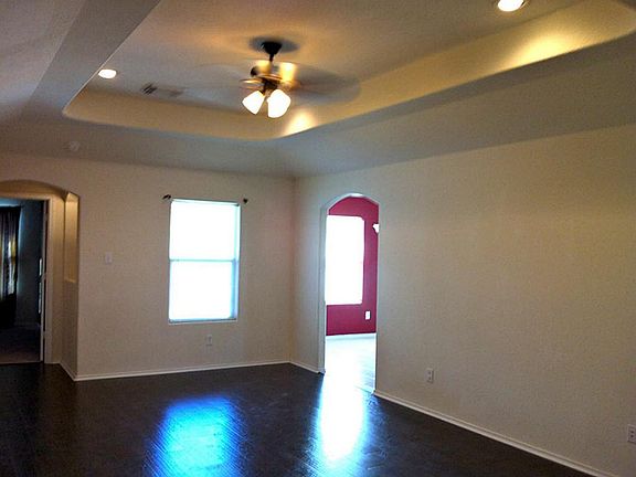 Beautiful recessed ceiling and laminate floors make decorating a breeze in this wonderful home.