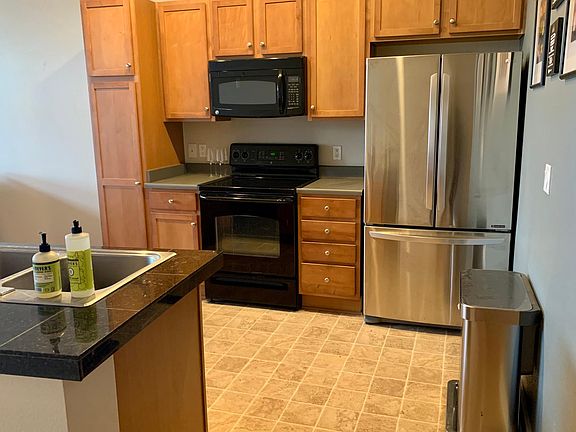 Kitchen with updated appliances and plenty of storage
